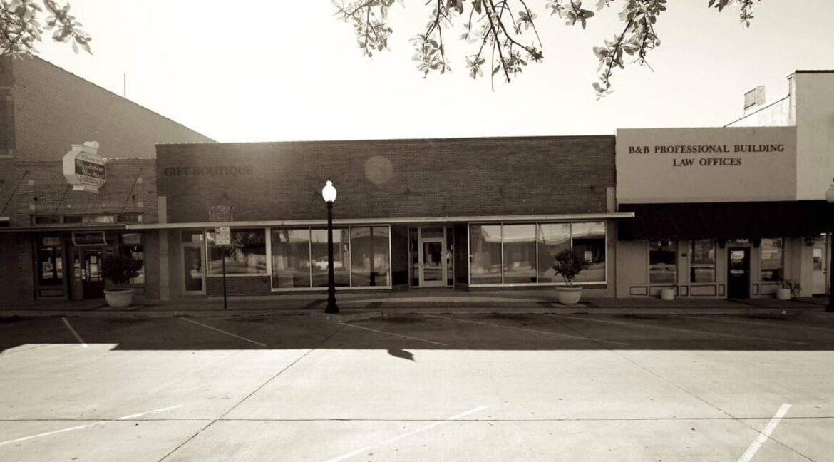 Street view of a commercial building with law offices in Bryan, Texas.