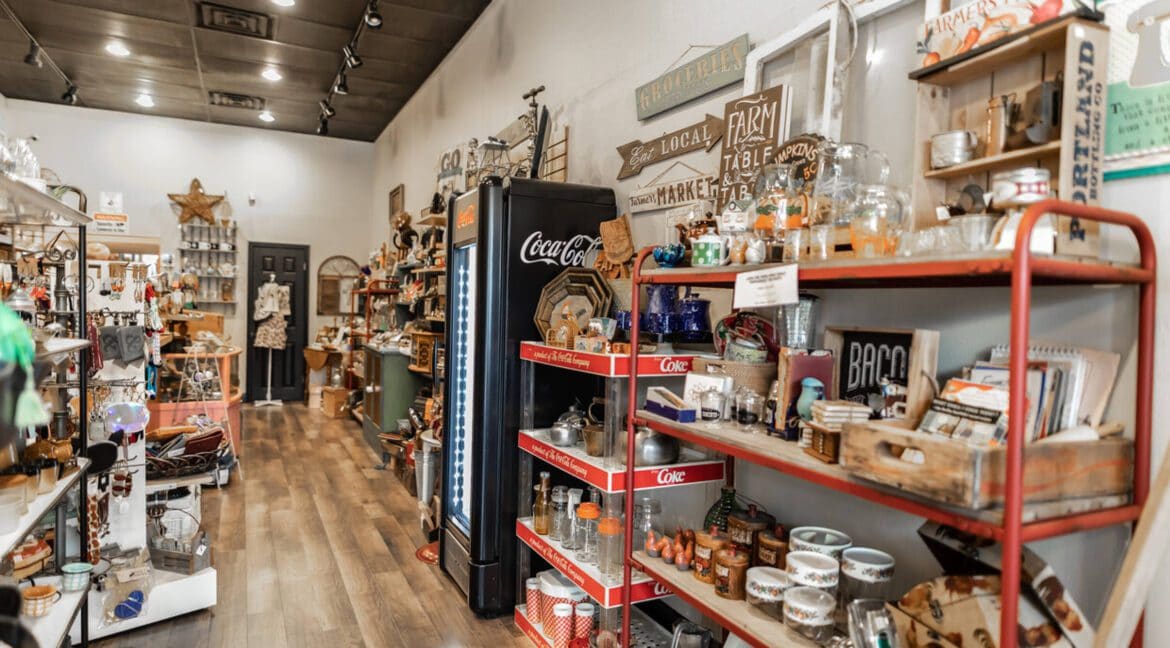Interior of a retail store with shelves of home decor and kitchen items in Bryan, Texas.